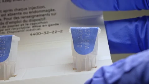 Ozempic pen injection needles demonstration. Needles stored separate and us.. Stock Footage 320086090