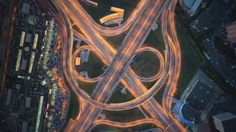 P-down time-lapse view of fast-moving cars on a highway Stock Footage 277081367