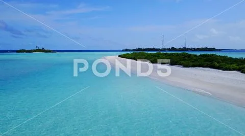 P02417 Aerial flying drone view of Maldives white sandy beach on sunny tropical Stock Photos