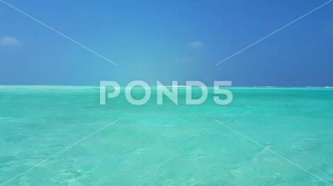 P02856 Maldives beautiful white sandy beach background on sunny tropical Stock Photos