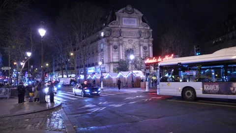 P1411680 A view of the Saint Michelfountain by night with a Christmas market Stock Footage 295965219