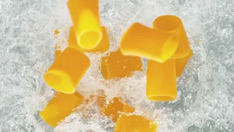 Paccheri Pasta Falling into Pot of Boiling Water Stock Footage 271398141