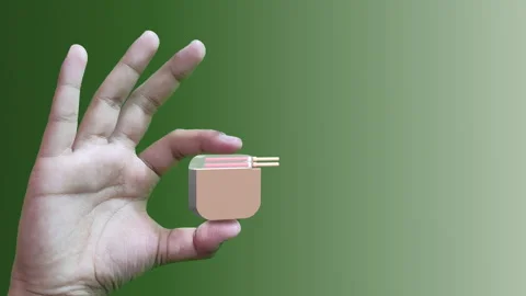 Pacemaker holding in hand with heartbeat wave Stock Footage 247574285