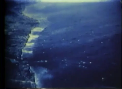 PACIFIC - 1943: Fleet underway - Great cloud stands above faint hulls Stock Footage 343931706