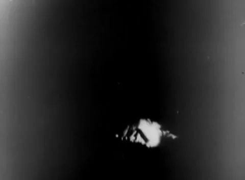 PACIFIC - 1944: Distant engagement - Small blast breaks dark horizon Stock Footage 344508018