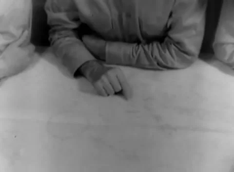 PACIFIC - 1944: Quiet human gesture - Folded hands rest in close-up Stock Footage 344507969