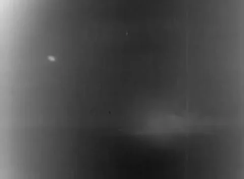 PACIFIC - 1944: Surface gunnery action - Gunfire and shell splashes engulf ships Stock-Footage 344507988