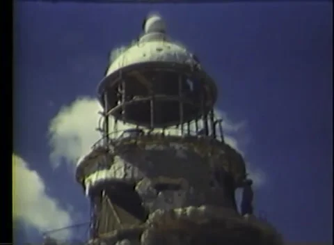 PACIFIC - 1945: Airfield control - A battered tower stands against the sky Stock Footage 343931963