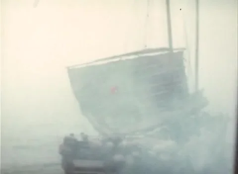 PACIFIC - 1945: Intercepted craft - A junk floats on a bright misted sea Stock Footage 343931525