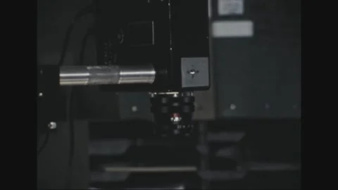 PACIFIC - 1973: Copy camera - Hand adjusts a copy-stand lens Stock Footage 344497214