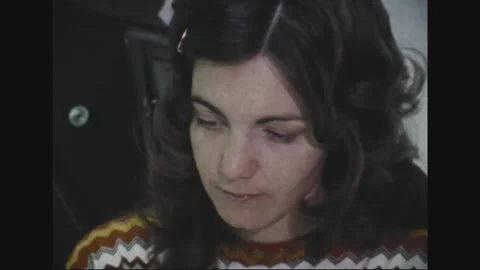 PACIFIC - 1973: Document handling - Worker pulls records across desk Stock Footage 344497251