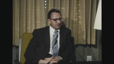 PACIFIC - 1973: Reflective staff portrait - Suited worker sits in thought Stock Footage 344496750