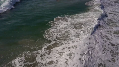 Pacific Beach Surfer in Waves Tilt Up Stock Footage 96040481
