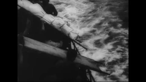 PACIFIC - CIRCA 1945: The American flag above a military cemetery Stock Footage 339065351