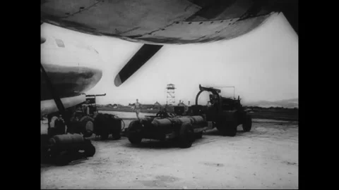 PACIFIC - CIRCA 1945: Rows of four-engine bombers on an airfield Stock Footage 339065350