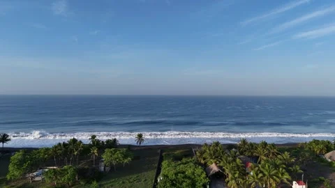 Pacific coastline with rolling waves at sunrise aerial view Stock Footage 339478975