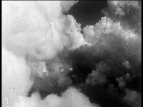 The Pacific Fifth Fleet approaches an island and sends a scout plane and Stock Footage