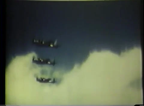 PACIFIC OCEAN - 1943: Air attack - Bomber Formation among Clouds Stock Footage 343786357