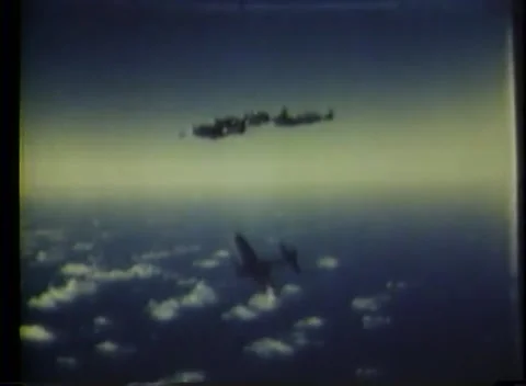 PACIFIC OCEAN - 1943: Air attack - Aircraft Silhouette above Clouds 스톡 동영상 343786389