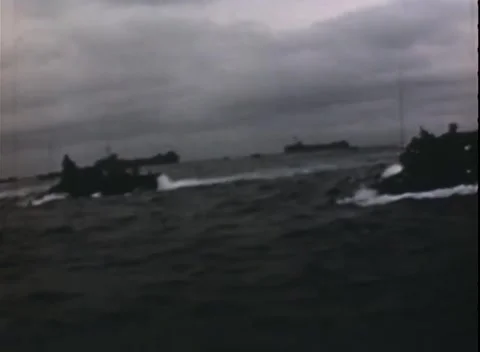 PACIFIC OCEAN - 1944: Landing run — a craft laboring in a heavy sea 库存影片 343119955