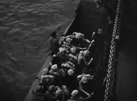 PACIFIC OCEAN - 1945: Amphibious ops - Helmeted Troops Packed in Landing Stock Footage 343786814