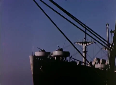 PACIFIC OCEAN - 1945: Fleet transit - Ship Bow and Gun Tubs above Water Stock Footage 343787036