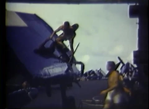 PACIFIC OCEAN - 1945: Sunbathing on deck — sailors stretch out on deck mats Video stock 343119754