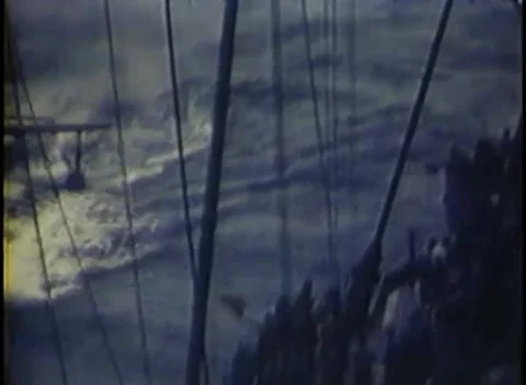 PACIFIC OCEAN - 1945: Warship under way — rigging above a ship's trailing wake Video stock 343120286