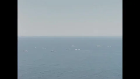 PACIFIC OCEAN - 1955 - US Navy sailors prepare to drop nuclear depth charges in Stock Footage 341994037