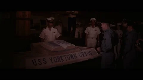PACIFIC OCEAN - 1968 - The Apollo 8 astronauts are given a sword to slice a cake 動画素材 312873853