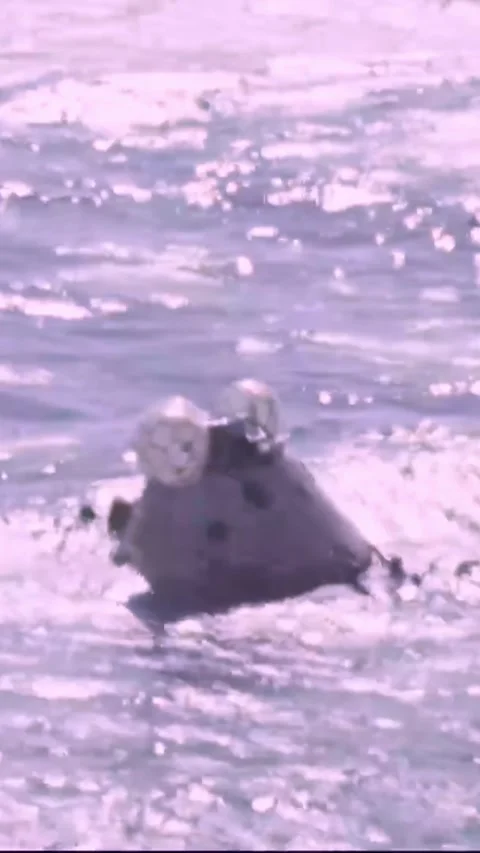 PACIFIC OCEAN - 1973 - US Navy helicopters hover over the Skylab 2 command Stock Footage 342675755