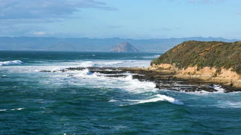 Pacific ocean, cliffs, and  Morro Rock, view om Montana del Oro state park,CA Stock Footage 150058352