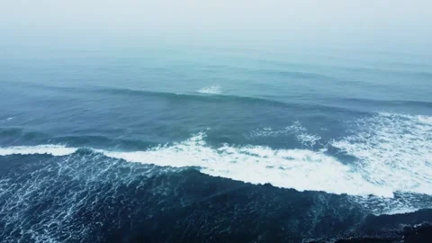Pacific ocean coast with black volcanic sand. Kamchatka, Russia. Video stock 244867548