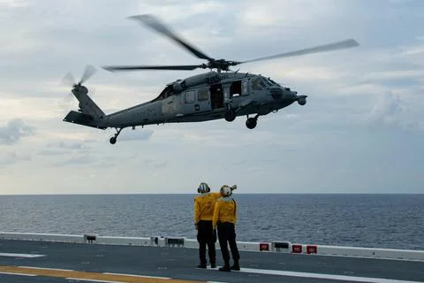 PACIFIC OCEAN (Oct. 3, 2022) Aviation Boatswains Mate (Handling) Airman C.. Photos