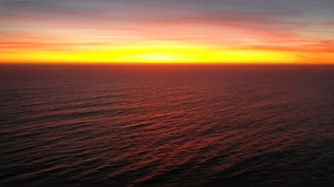Pacific Ocean waves approaching Chile coastline during sunset, awe scenics Video stock 117070560