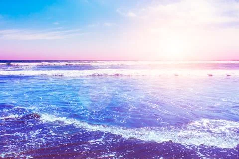 Pacific ocean waves at sunset Foto stock
