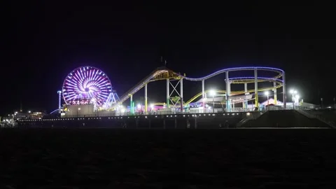 Pacific Park ferris wheel and roller coaster on Santa Monica Pier Vidéo 340920862