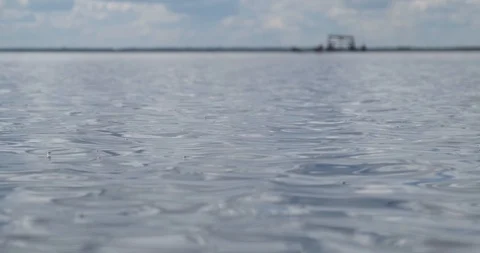 Pacifying picture of small waves on boundless shallow lake,water texture Stock Footage 118301188