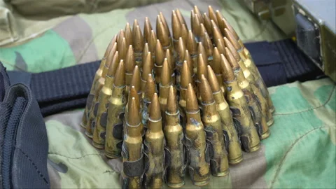 Pack of ammunition on the bar lying on the table - zoom out. Stock Footage 88229632