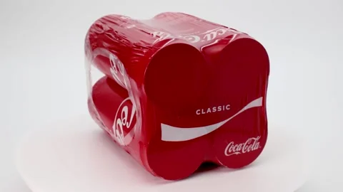 Pack of cans of classic Coca-Cola rotates on a white background. Stock Footage 170298831
