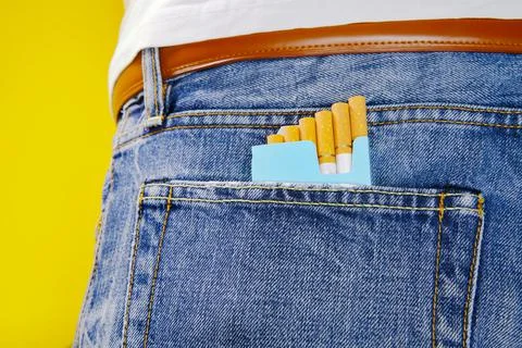 Pack of cigarettes in pocket Stock Photos