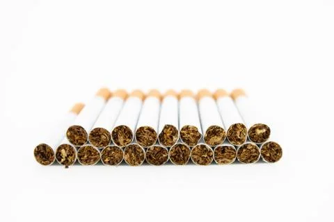 Pack of cigarettes on white background. Filtered cigarettes. Tobacco. Stock Photos