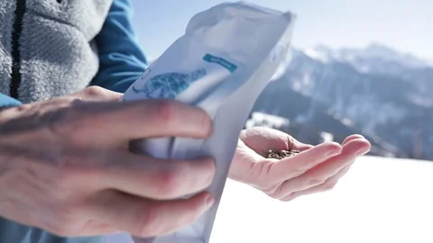 Pack of coffee beans outdoor winter mountain Stock Footage 171000529