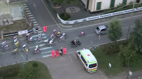 Pack of cyclists steadily following the path Stock Footage 22203979