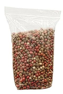 Pack of dry pepper corn.Isolated. Stock Photos
