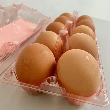 A pack of egg on the table Stock Photos