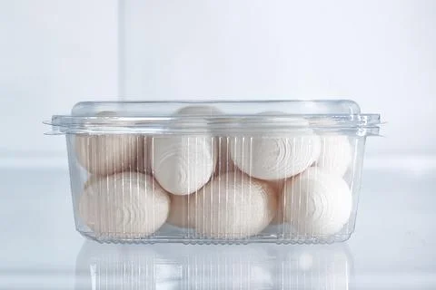 Pack of eggs in the refrigerator Stock Photos