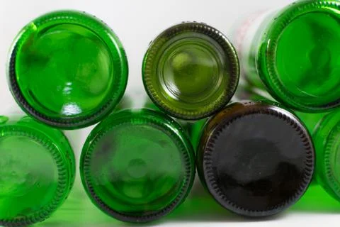 Pack of empty beer and wine green and brown glass bottom bottles, on a white  Stock Photos