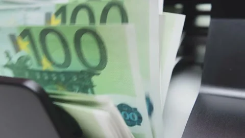 A pack of euros is counted at an ATM Stock-Footage 183957046