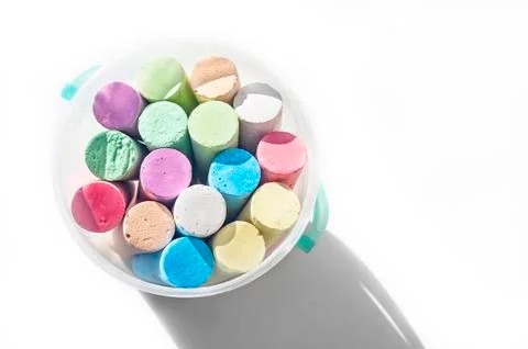 Pack of Jumbo Sidewalk Chalk, Assorted Colors in a Plastic Bucket on White Ba Stock Photos